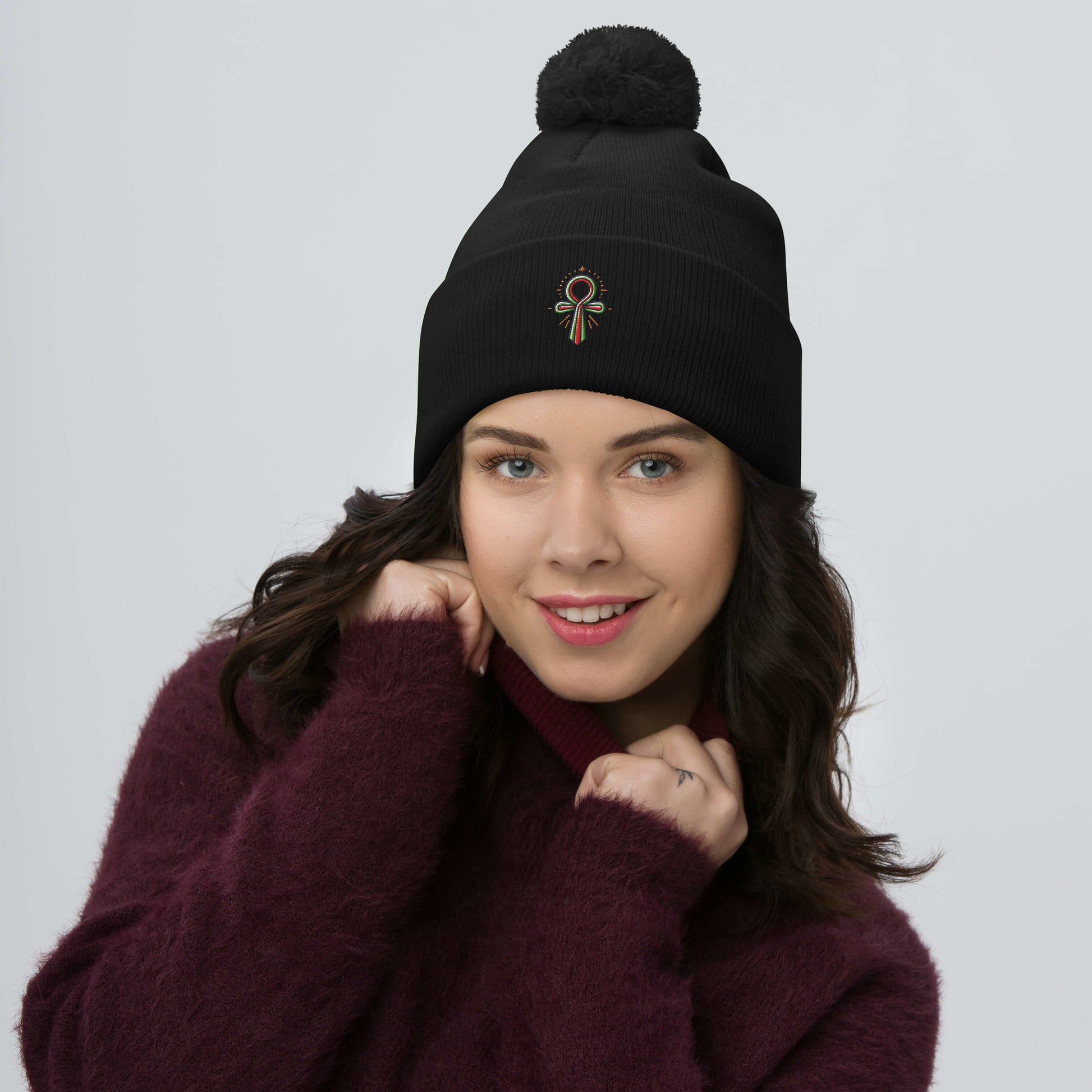 Pom-Pom Beanie with Ankh Charm – Stylish & Cozy pom-pom Refine Zone