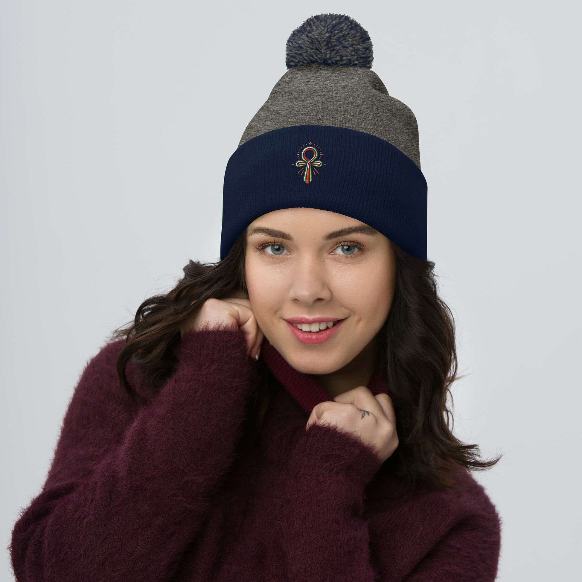 Pom-Pom Beanie with Ankh Charm – Stylish & Cozy pom-pom Refine Zone