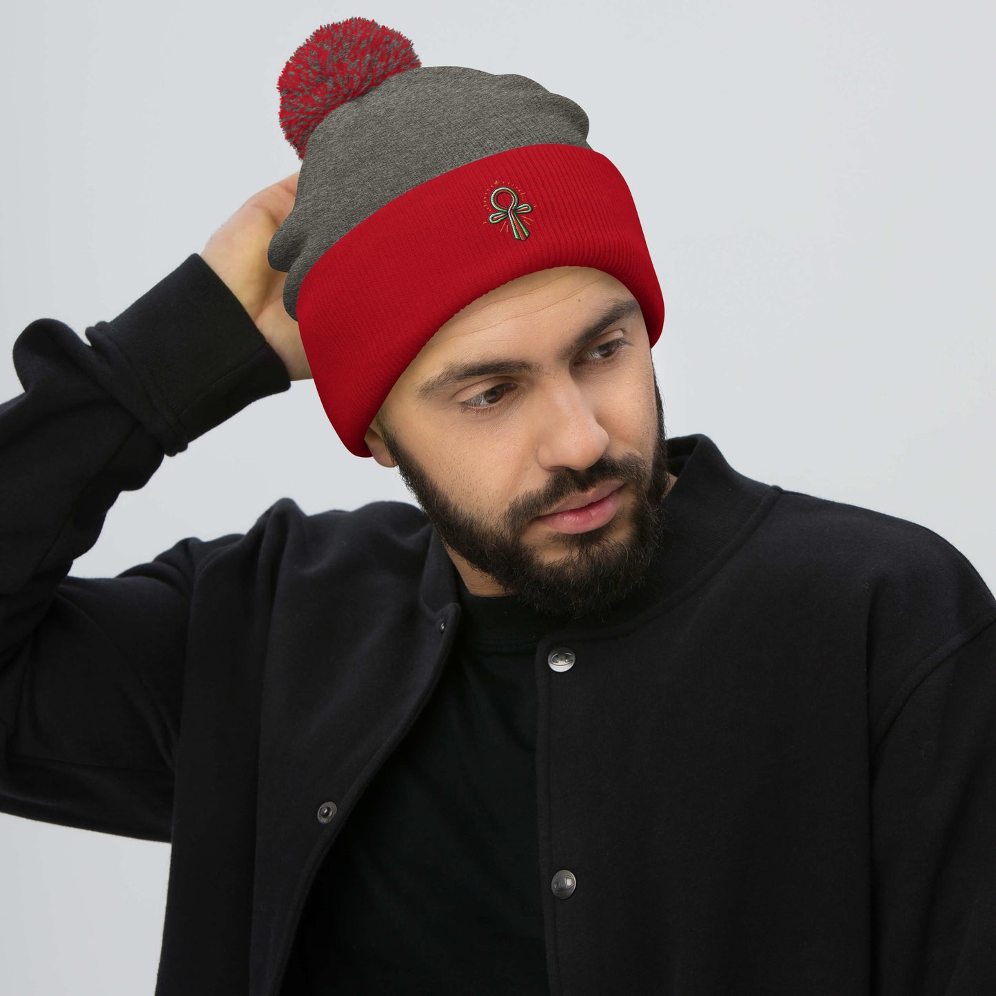 Pom-Pom Beanie with Ankh Charm – Stylish & Cozy pom-pom Refine Zone